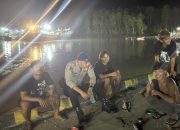 Personel Sat Polairud Polres Mimika Ingatkan Pentingnya Keselamatan Berlayar kepada Nelayan