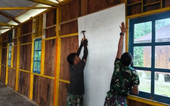 Pembangunan Gereja Santo Klemenst Berlanjut, Satgas TMMD Kerjakan Dinding Bagian Dalam